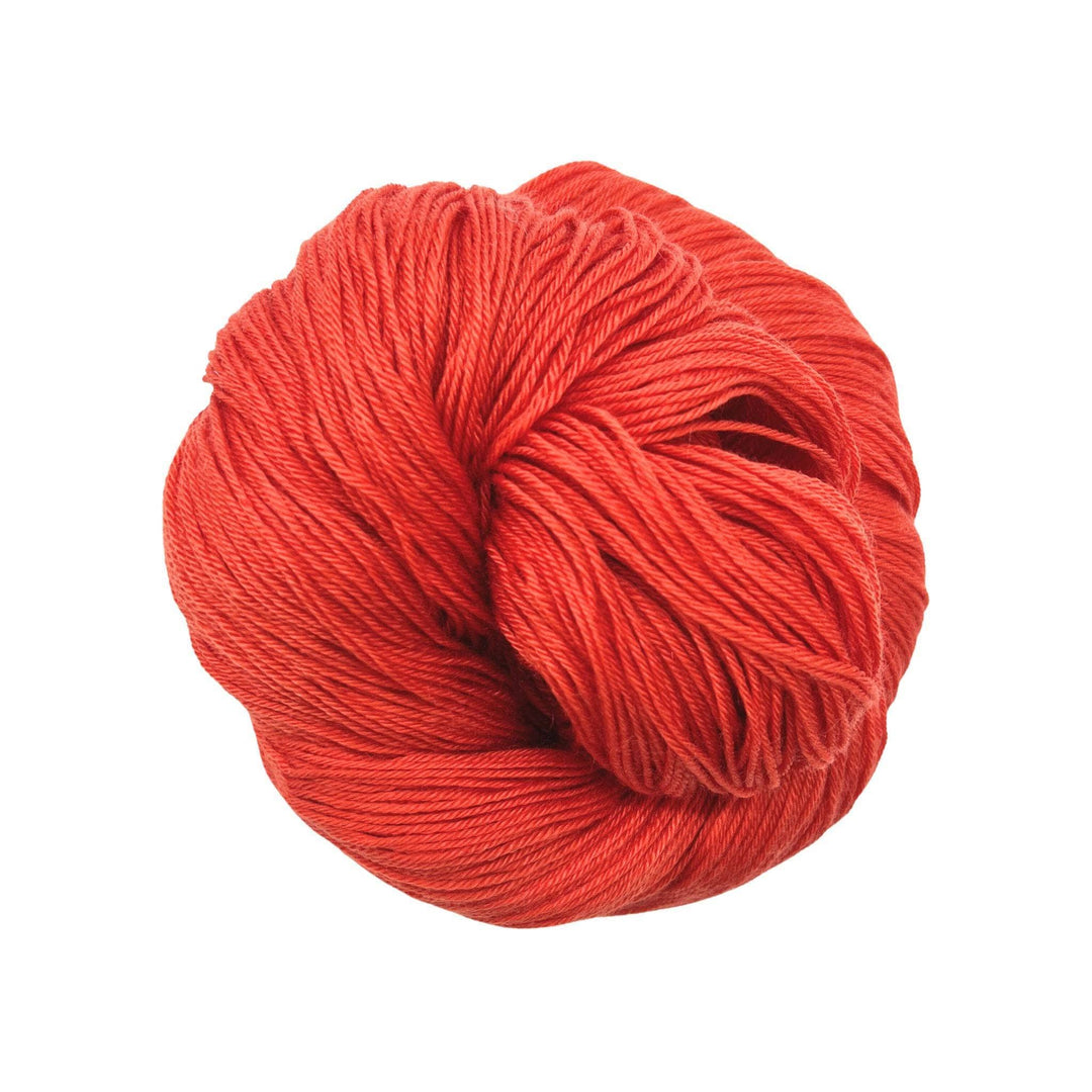 Bright red yarn on white background