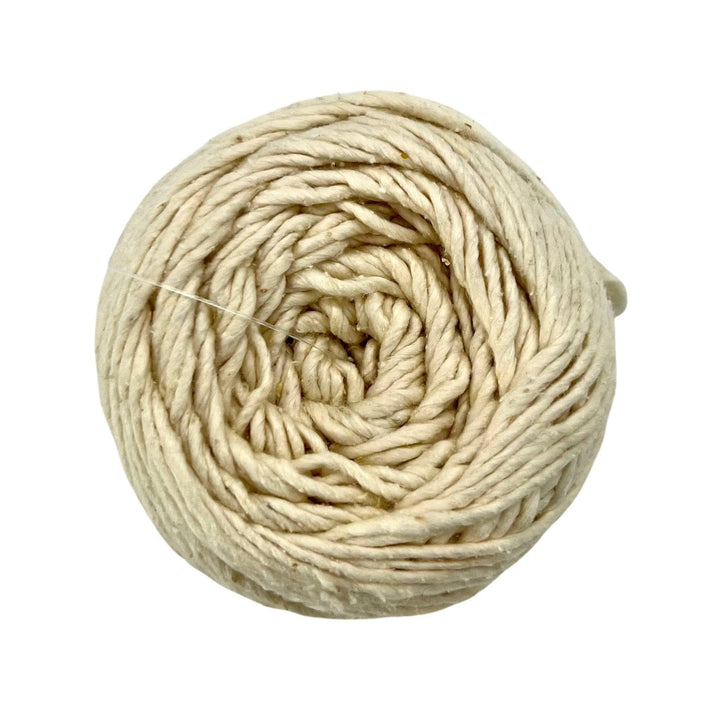 Worsted Weight Roving Silk Yarn dandelion pouf on a white background 