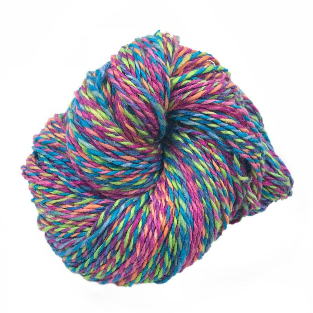 pink, blue, lime green, blue and purple yarn on a white background
