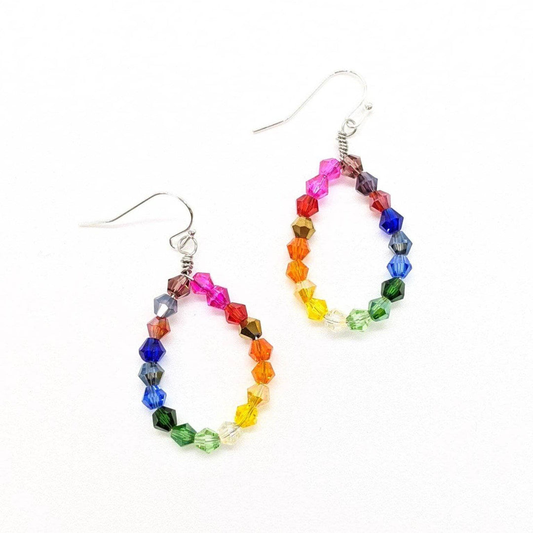 Geometric Rainbow Earrings  on a white backdrop. 