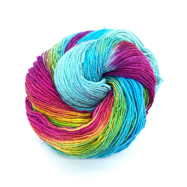 blue and rainbow skein of yarn on a white background