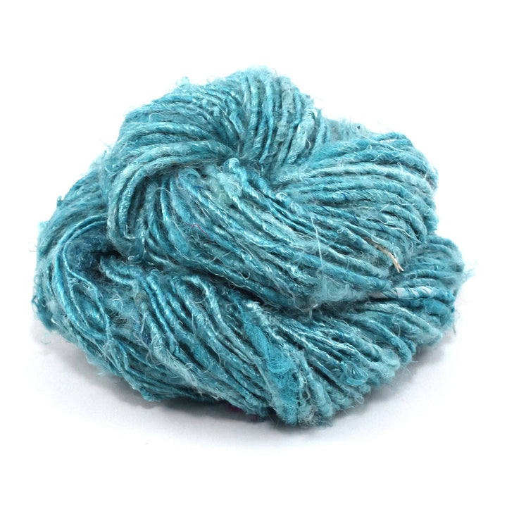 close up of yarn cake in the color sea mist