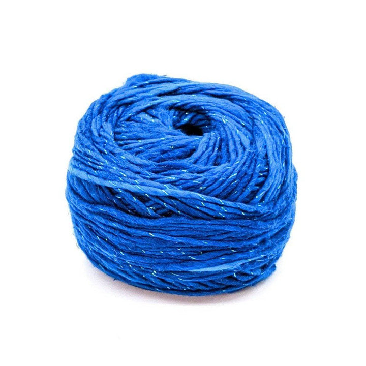 A cake of sparkle blue yarn on a white background