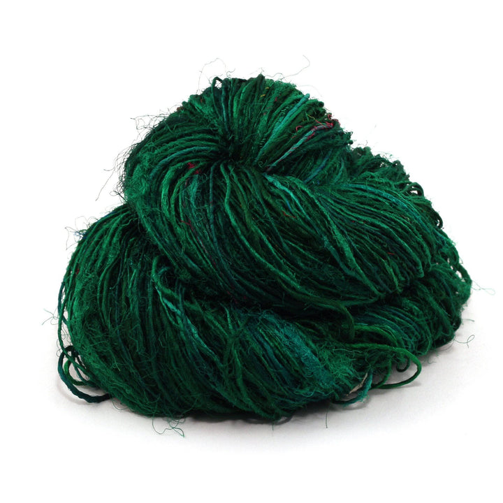 Handspun Sport Weight Recycled Silk Yarn over a white background