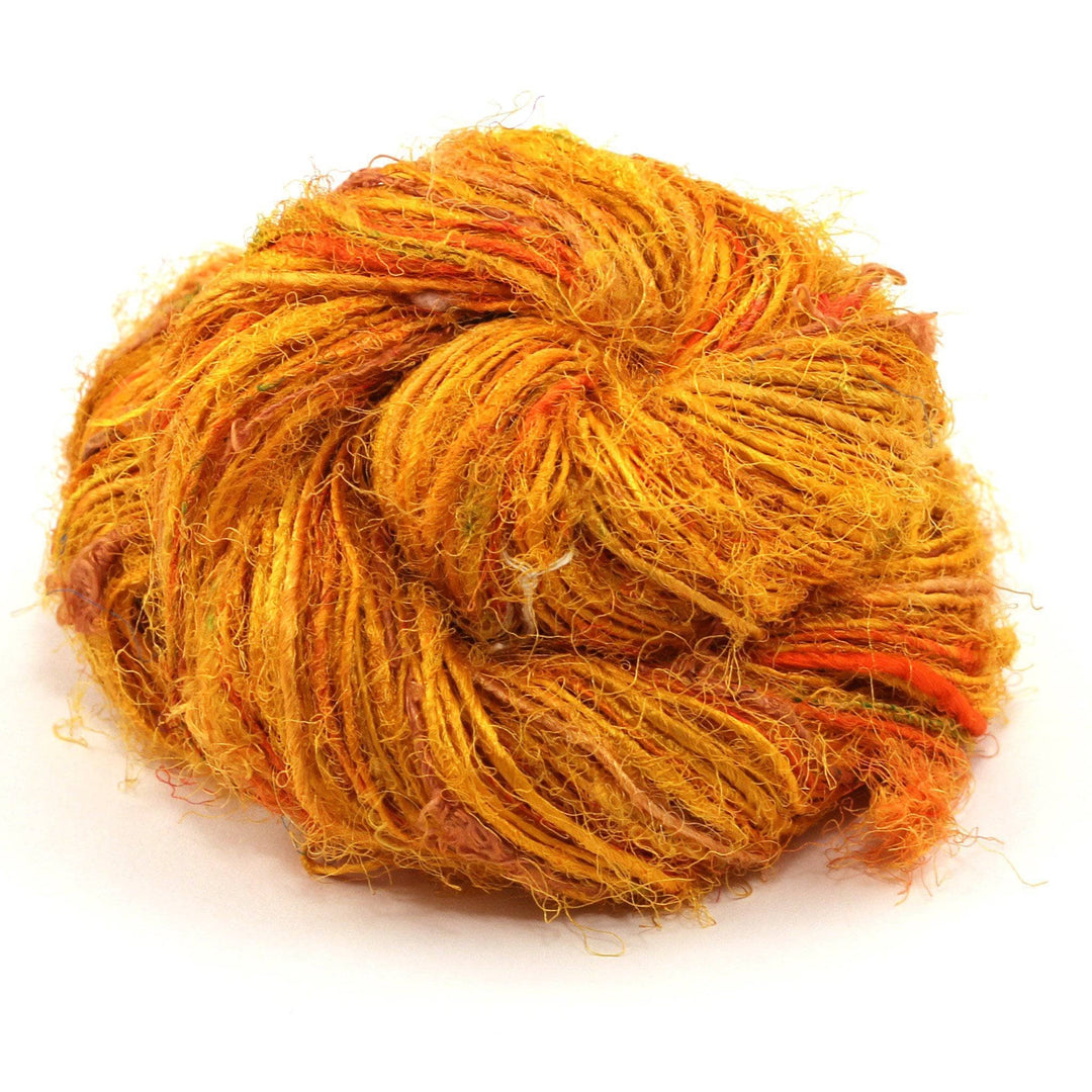 Handspun Sport Weight Recycled Silk Yarn over a white background