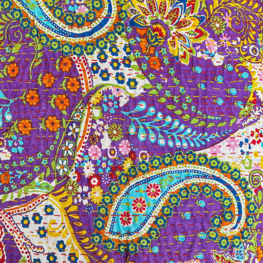 Closeup of paisley fiesta kantha quilt pattern. 