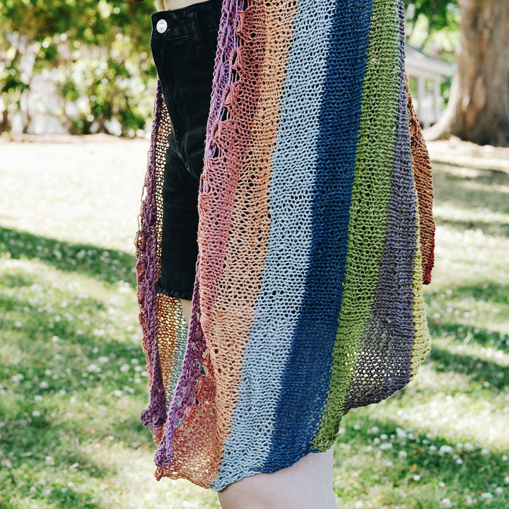 Closeup image of knit herbal sunrise shawl, herbal dyed silk yarn mini skein pack