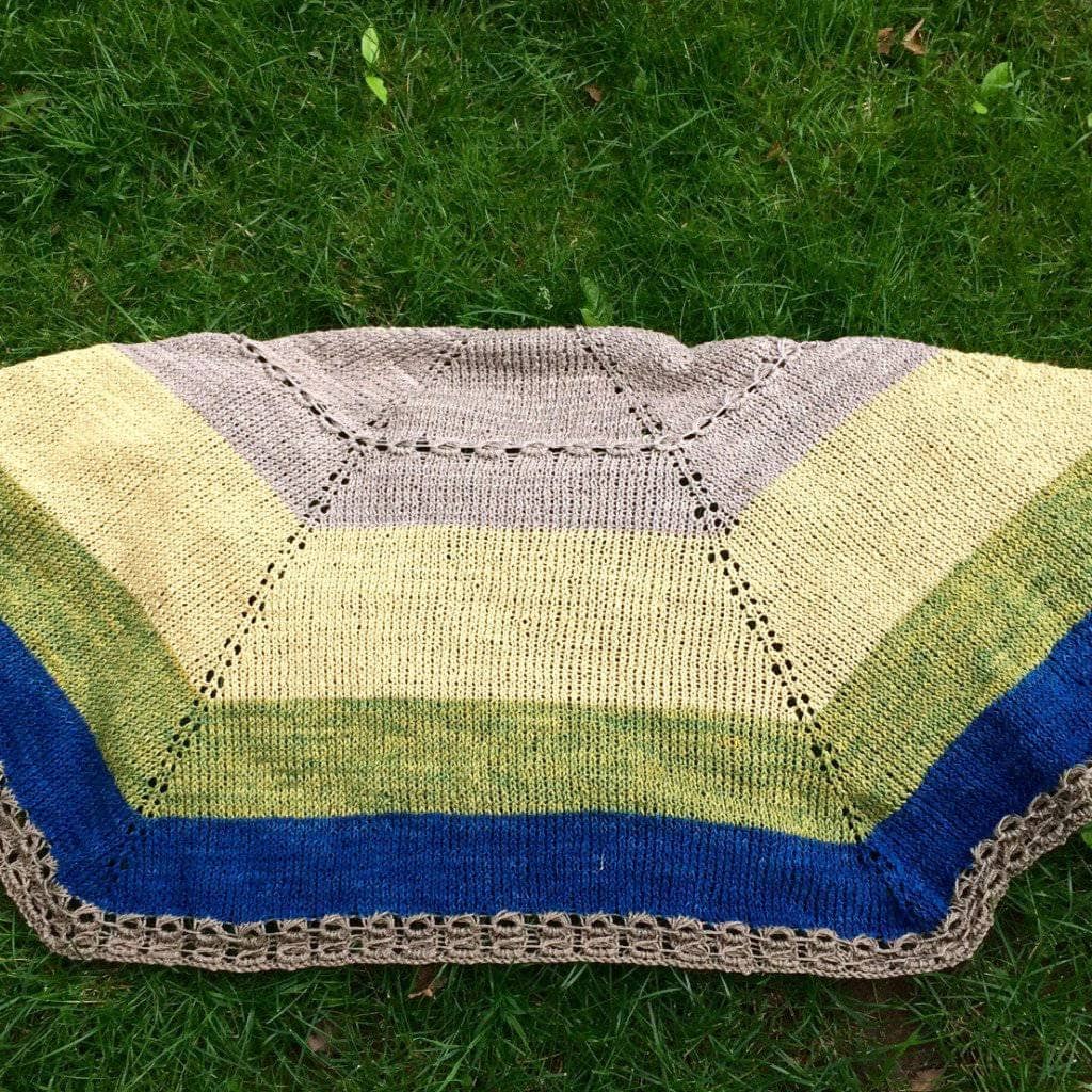 close up of shawl over grass