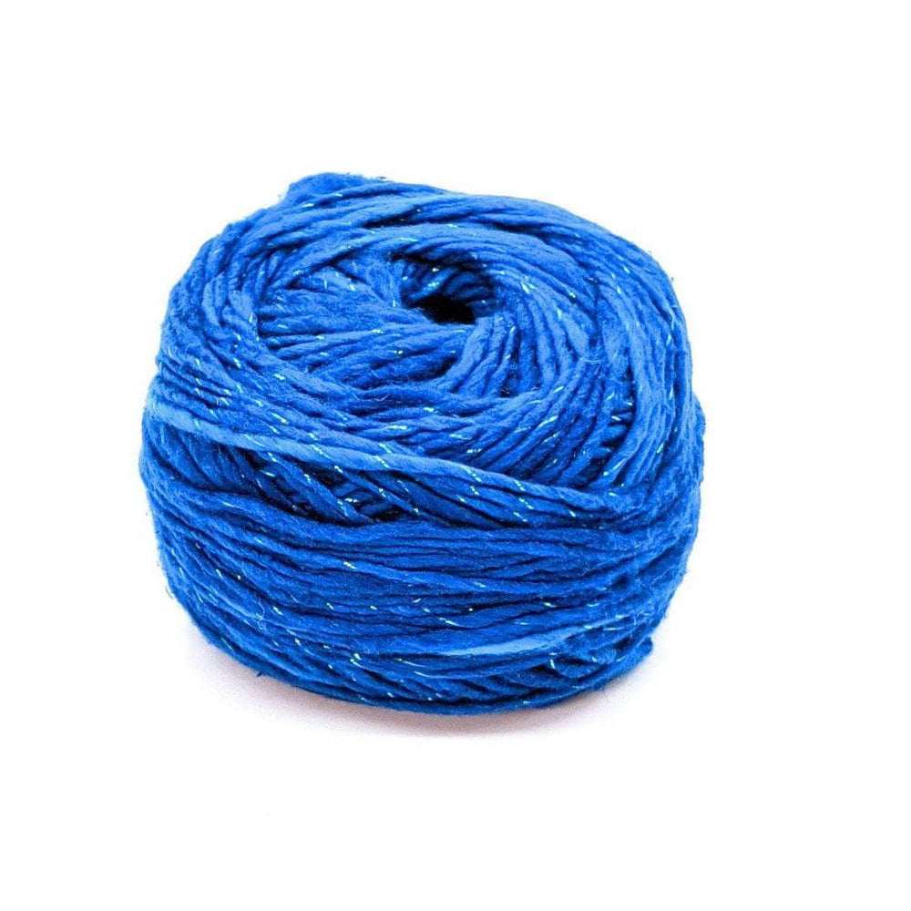 A cake of sparkle blue yarn on a white background