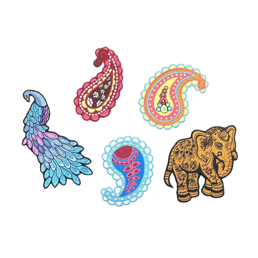 Five embroidered patches in front of white background. Left to right: Blue pink and purple peacock, Red yellow white and brown paisley, Light and dark blue paisley with pink flower, Yellow pink and light blue paisley, Golden brown elephant with black designs and edging. 