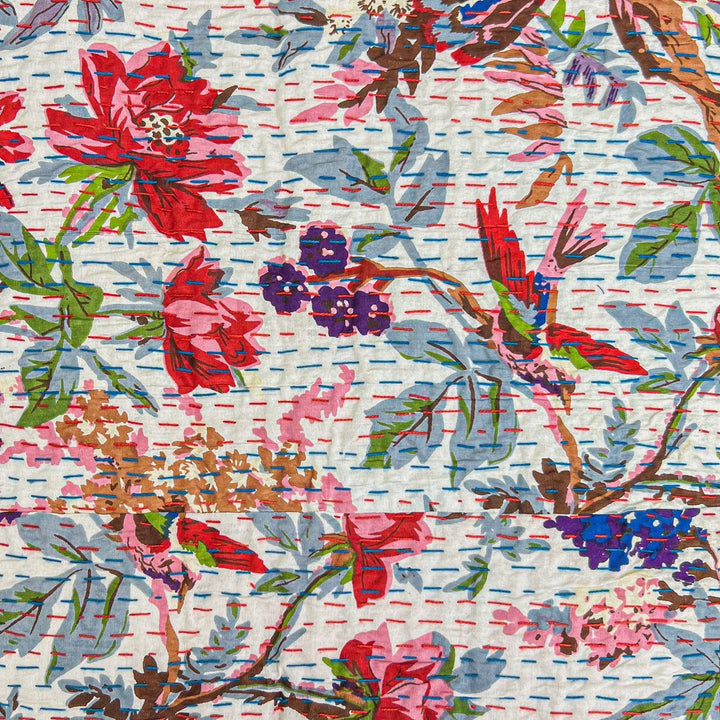 Closeup of vibrant rainforest kantha pattern.