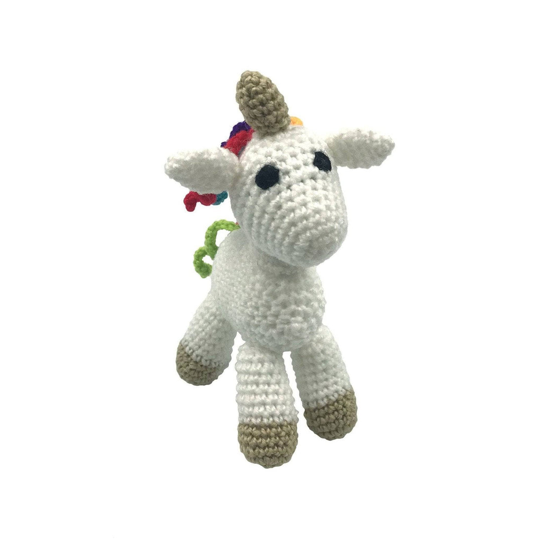 Completed unicorn amigurumi crochet kit with rainbow mane and tail in front of a white background.