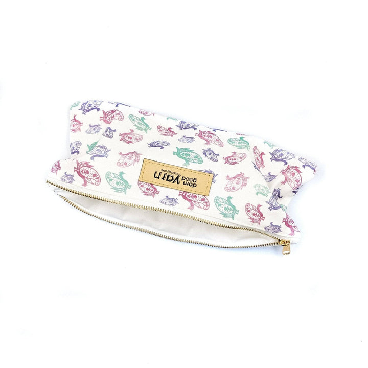 Unzipped Multicolored paisley bag on a white background 