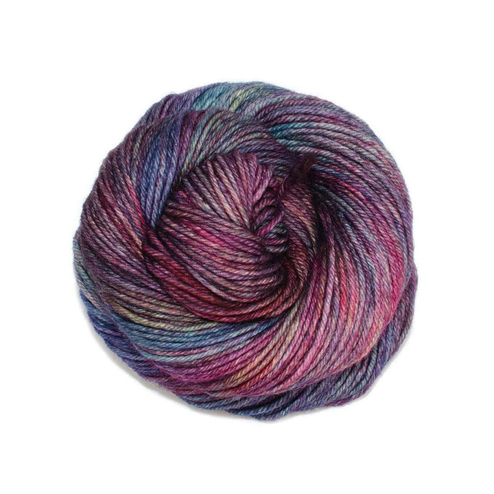 A skein of variegated pink, blue and purple yarn on a white background