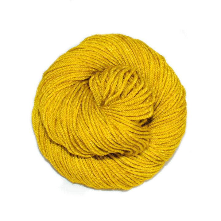 skrin of bright yellow yarn in front of a white background.