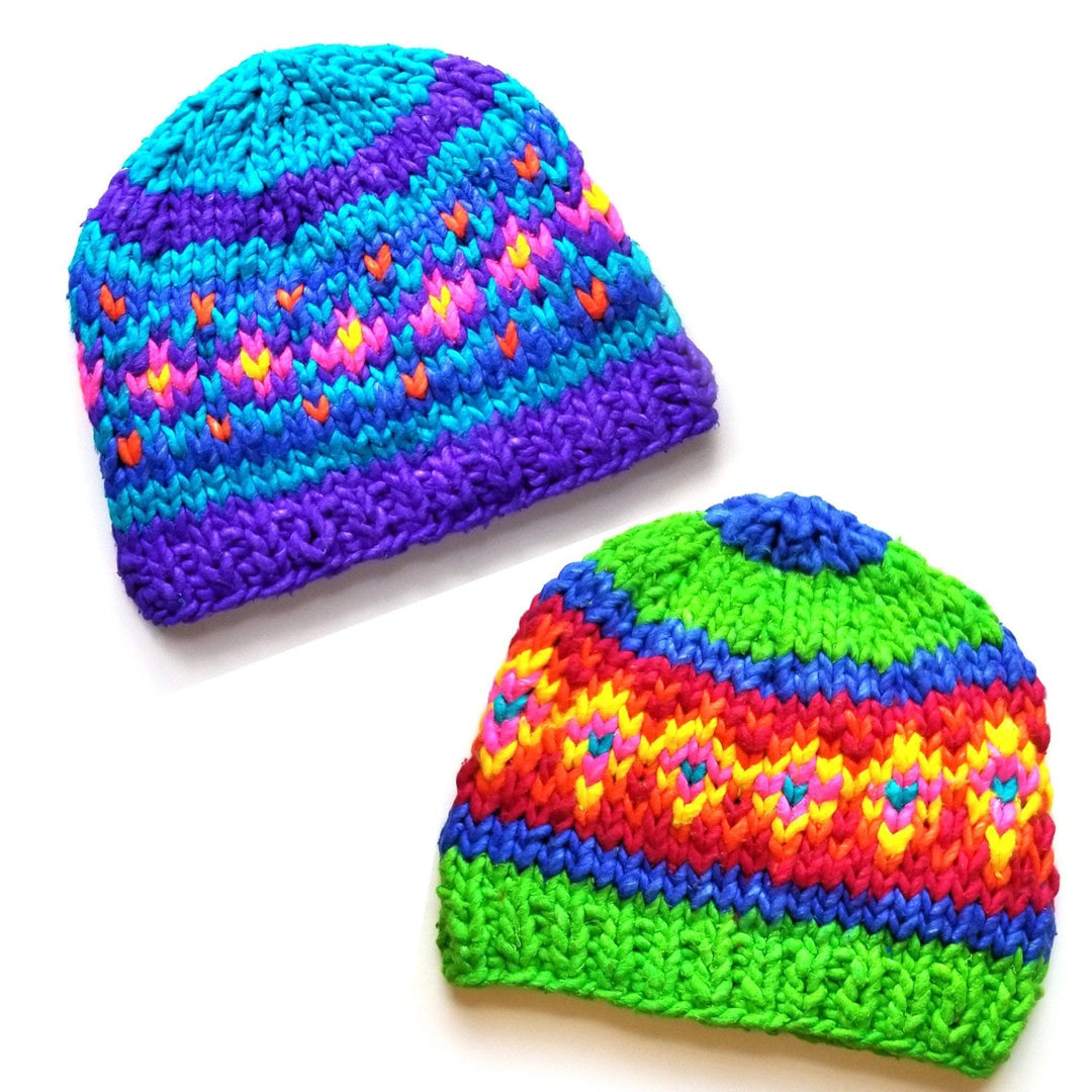 multicolored beanies on a white background