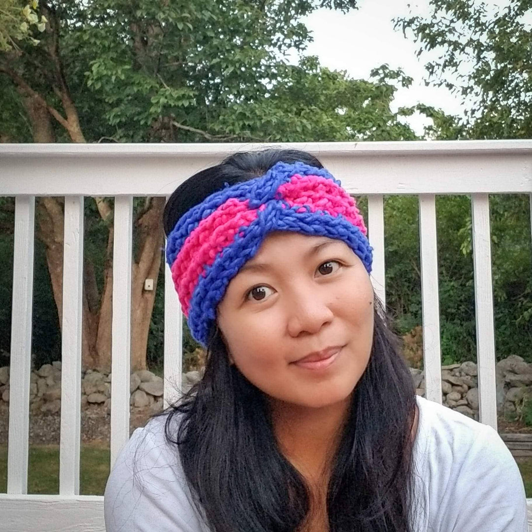 women wearing a pink and purple headband outside