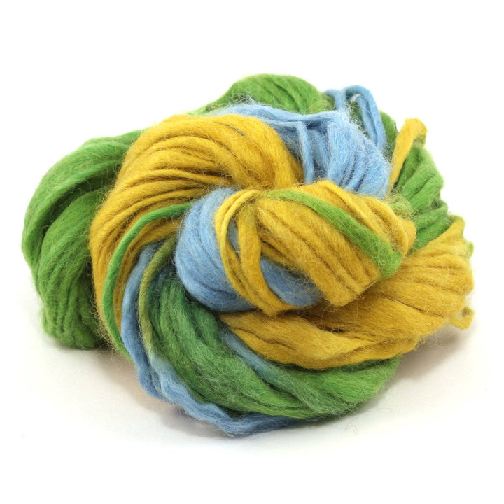 cake of yarn in the color summer days (yellow green and light blue) with a white background