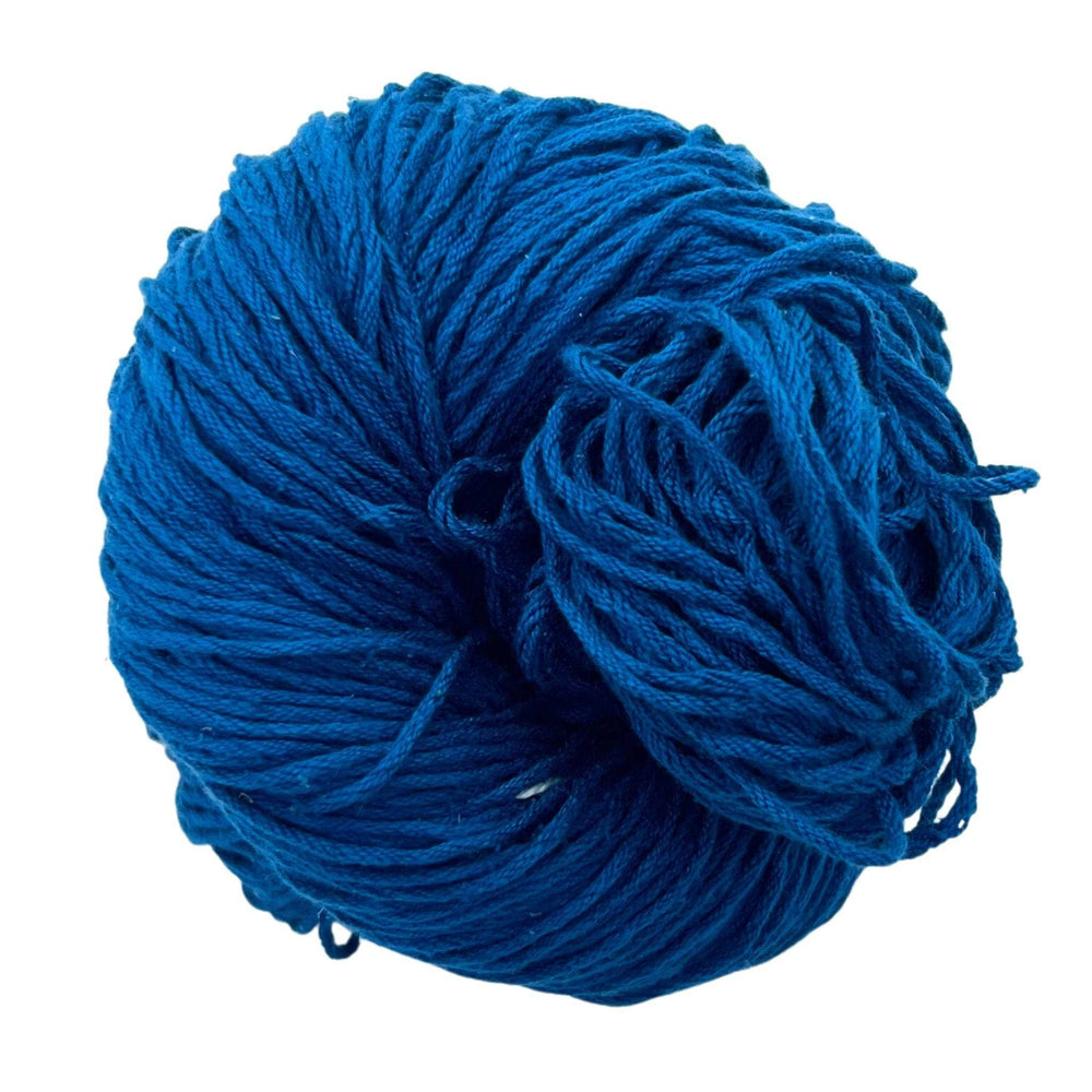 A skein of Mulberry silk fingering yarn in the colorway 'brilliant blue' on a white background.