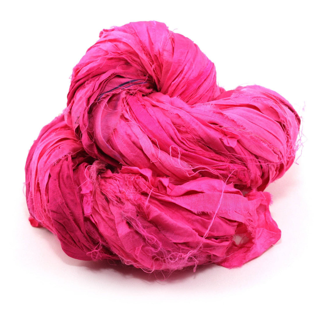yarn cake in the color nitrogen pink with a white background