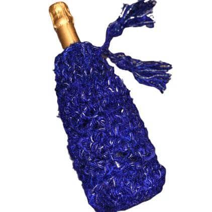 A sparkle indigo bottle cover with a gold bottle tip coming out from the top of the cover on a white background