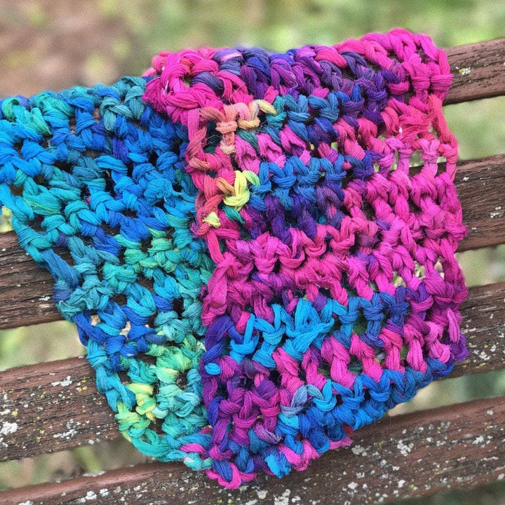 colorful scarf over a wooden chair 