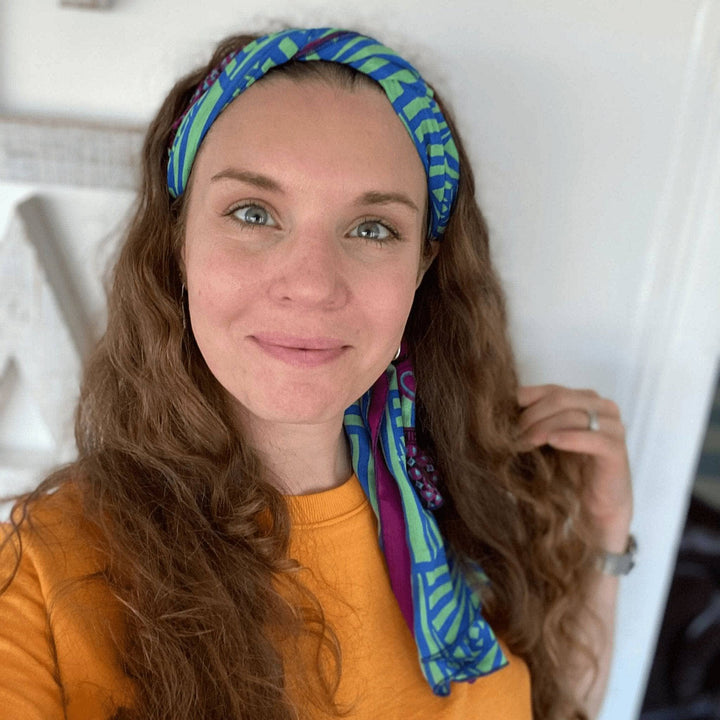 Founder Nicole wearing a blue one of a kind sari scarf as a headband
