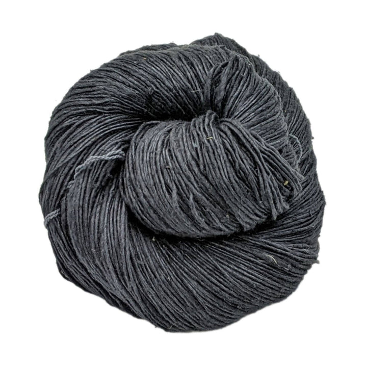 lace weight silk yarn black in front of a white background