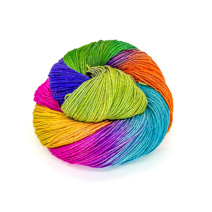 Close up image of sport weight hand dyed pride themed yarn Baker rainbow flag colors.