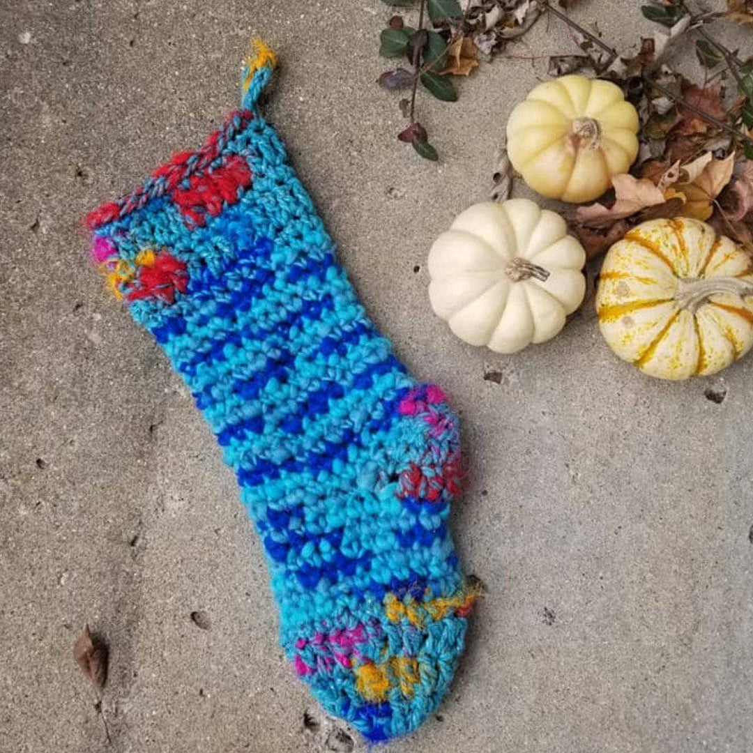 blue holiday Stocking hanging in a wall