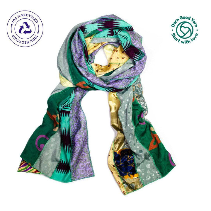 flat lay of medley scarf in  green colors with darn good yarn branding