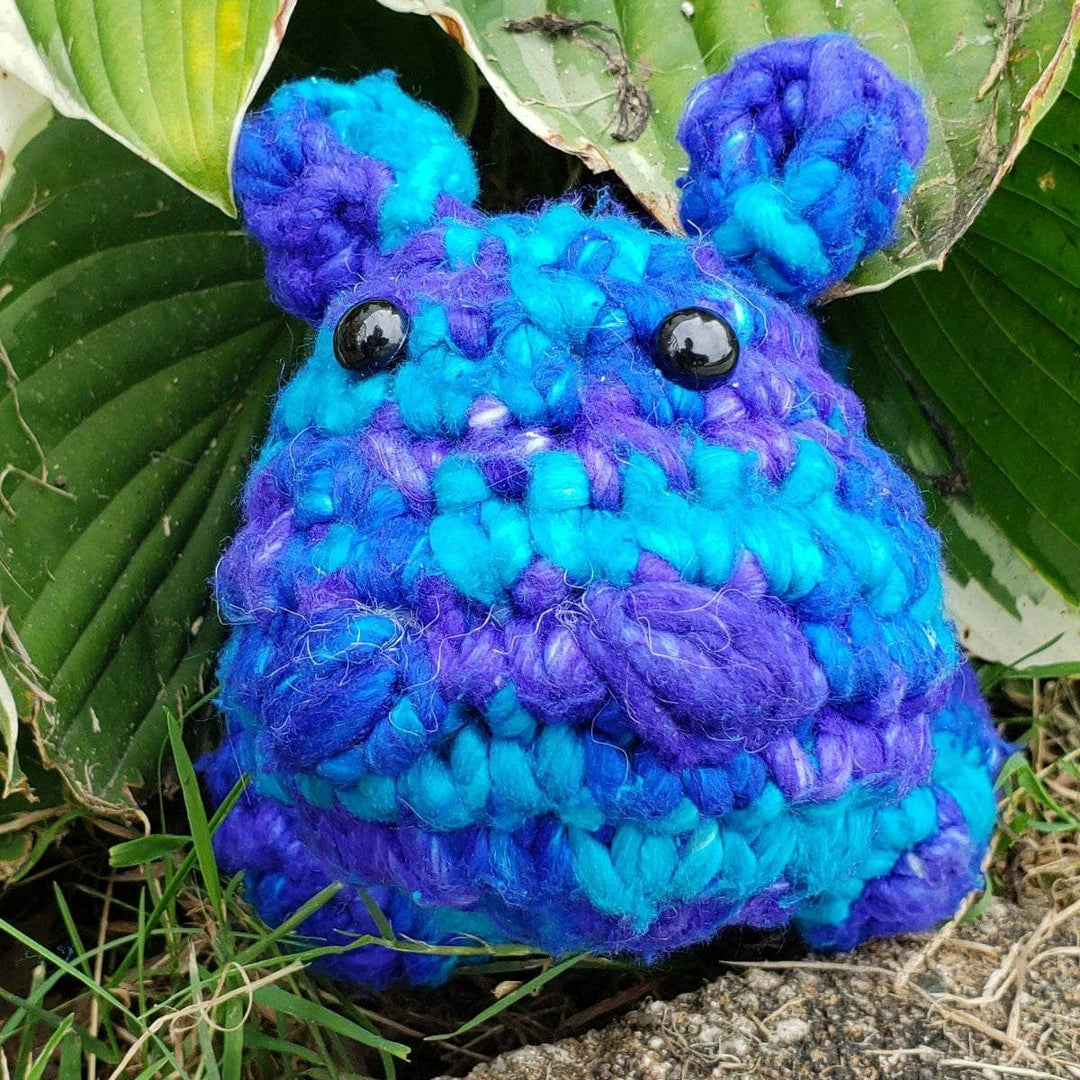 face of small crochet hippo