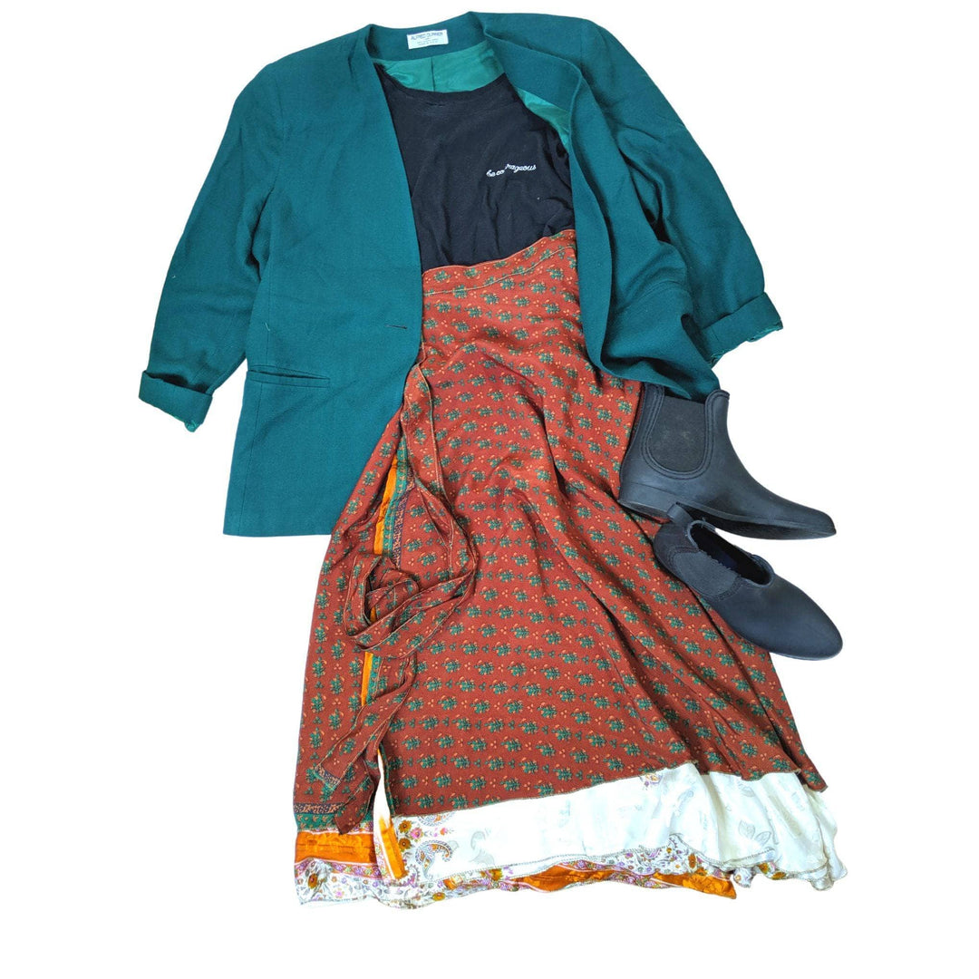 flat lay of skirt with teal balzer