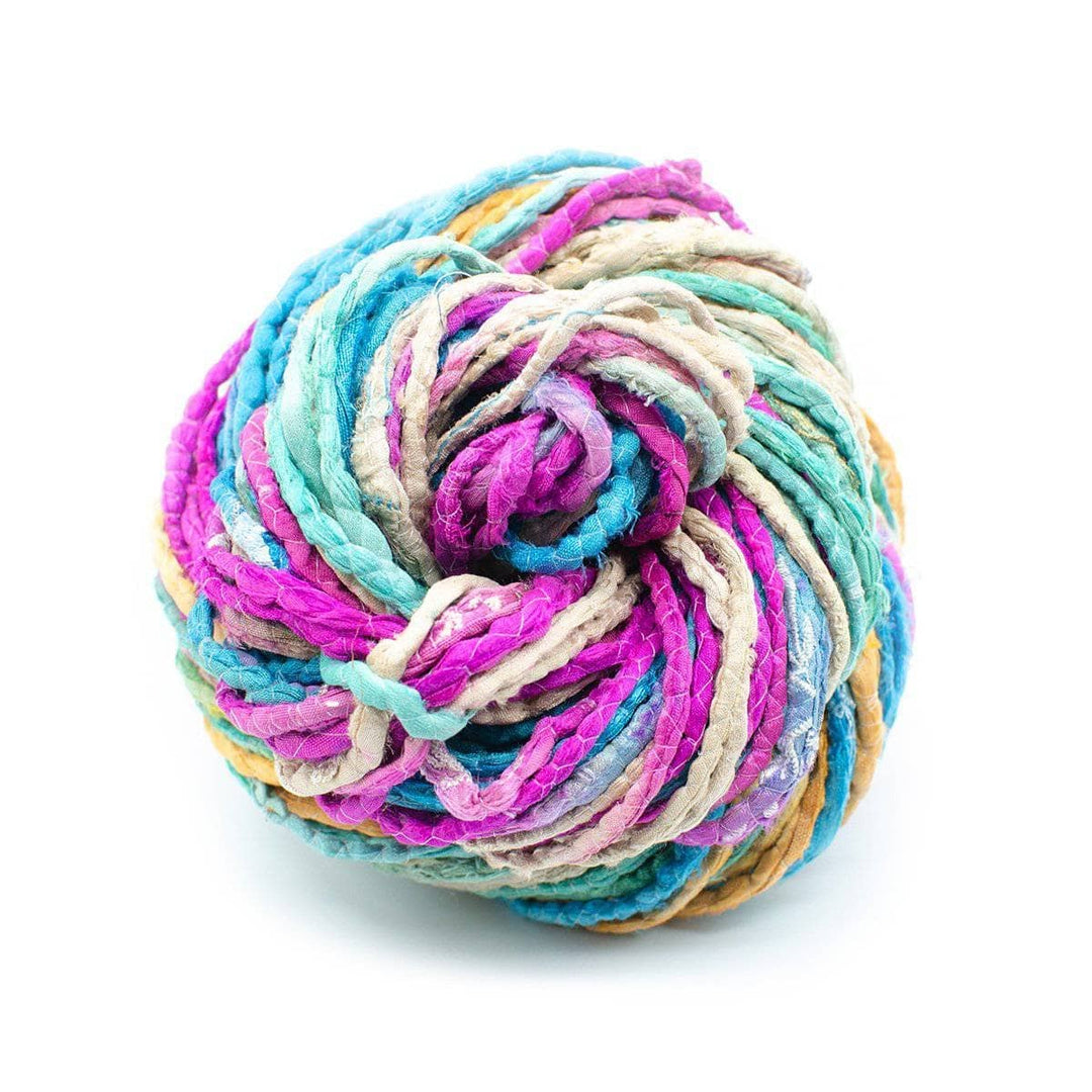Multicolored (pink, yellow, white, blue, green-teal) Sari silk cording yarn on a white background