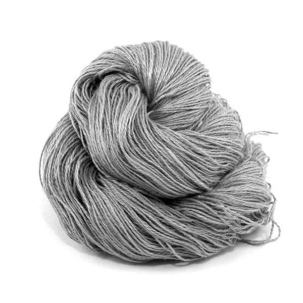 A gray skein of linen yarn on a white background 