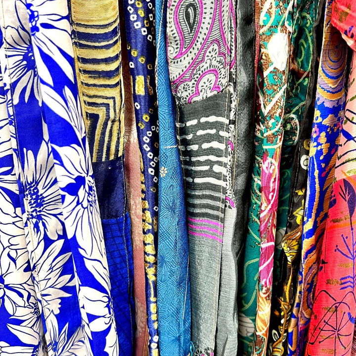 Aanya Adjustable Sari Kaftans Hanging. Showing the stitching and patterns