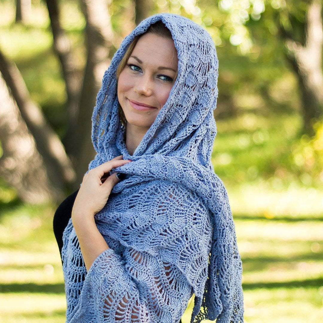 woman showing off her Silk Waves Shawl outdoors