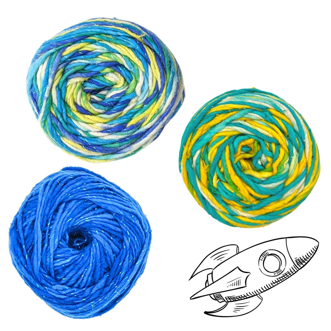 Neptune solar system yarn pack in front of a white background with black graphic in lower right. Sparkle worsted weight silk classic blue, stars in the night sky, silk roving worsted weight ocean light.