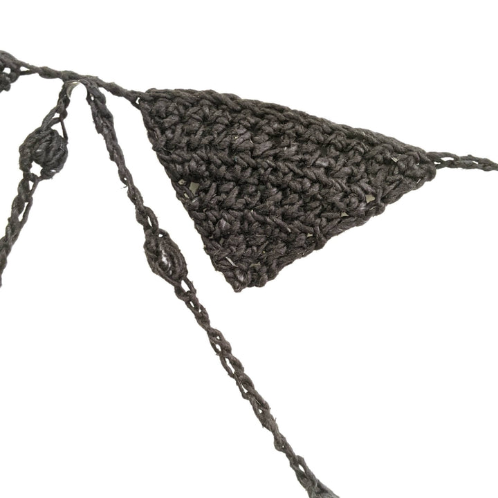 close up image of black halloween crochet bunting to show stitch detail.