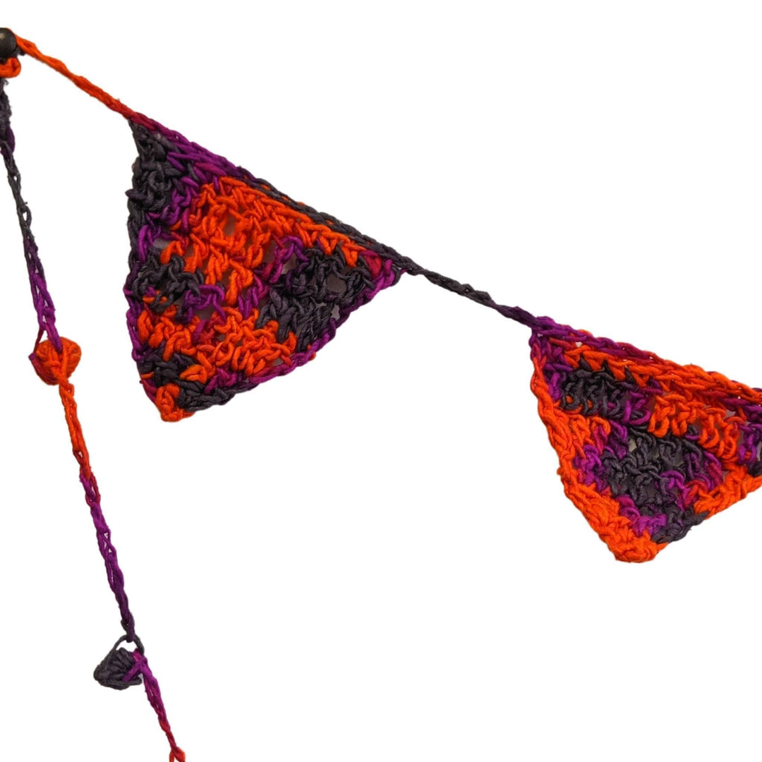 Close up image of festive cheer spooky chic halloween bunting to show stitch detail in front of a white background.