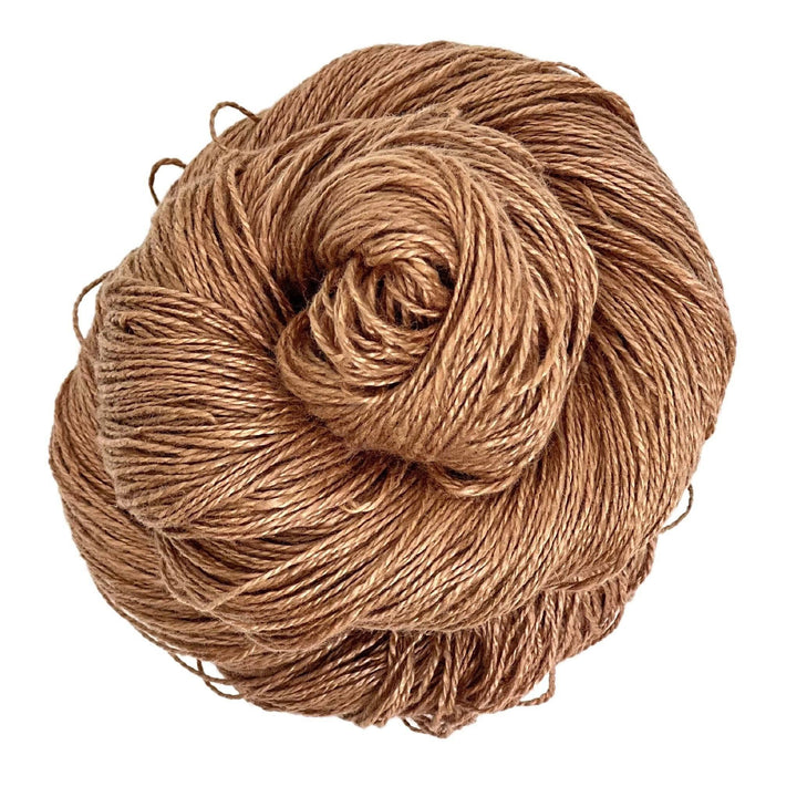 A skein of sport weight 2-Ply Linen Yarn in the colorway "Cinnamon" on a white background.