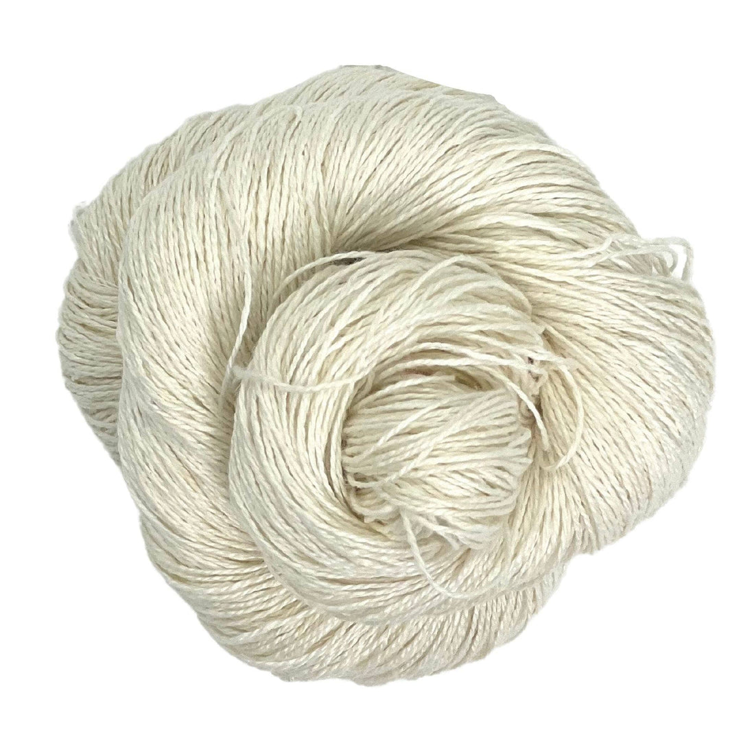 A skein of sport weight 2-Ply Linen Yarn in the colorway "Polar Bear White" on a white background.