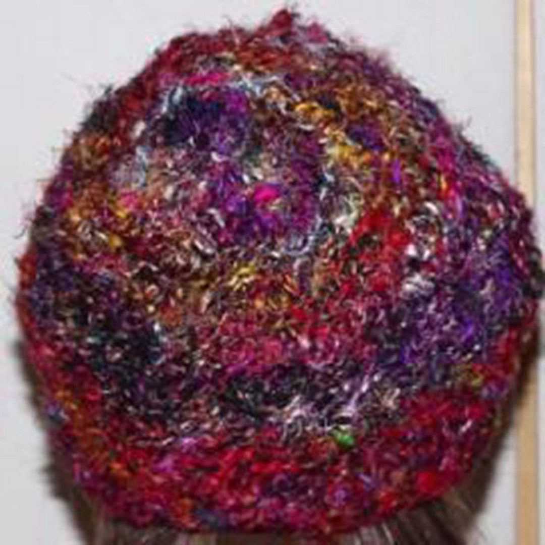Close up of the Spring Silk Slouchy Hat in red and purple on a white background