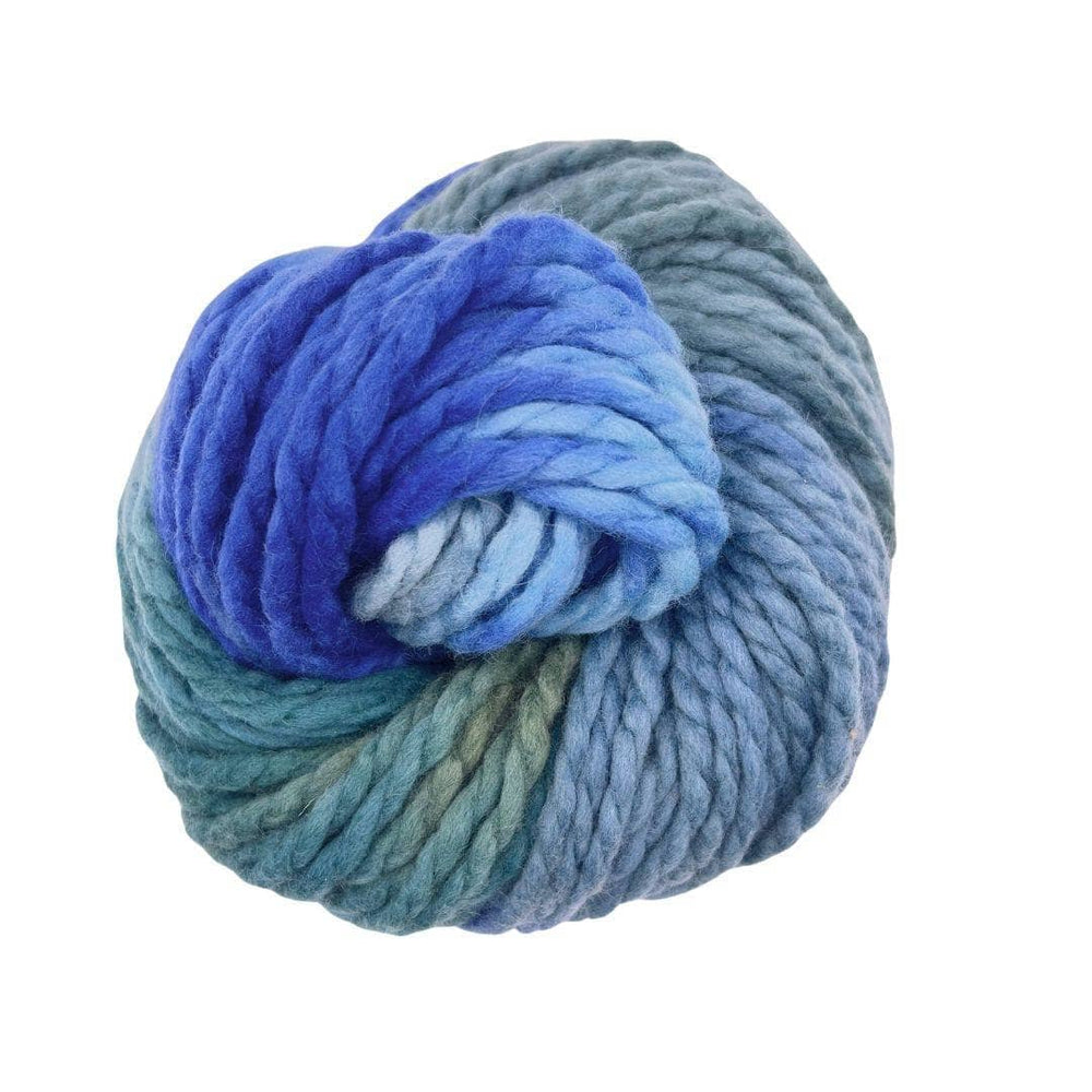 Multi colored blue bulky yarn on a white background