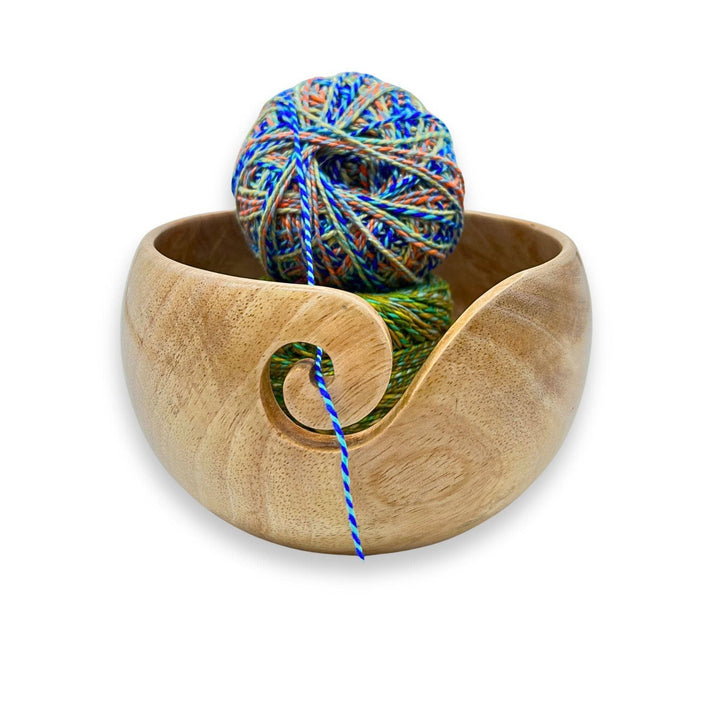 Yarn bowl with yarn inside of it