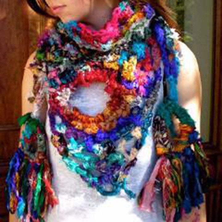 Woman The Eye of Creativity scarf in multicolored and a white tank