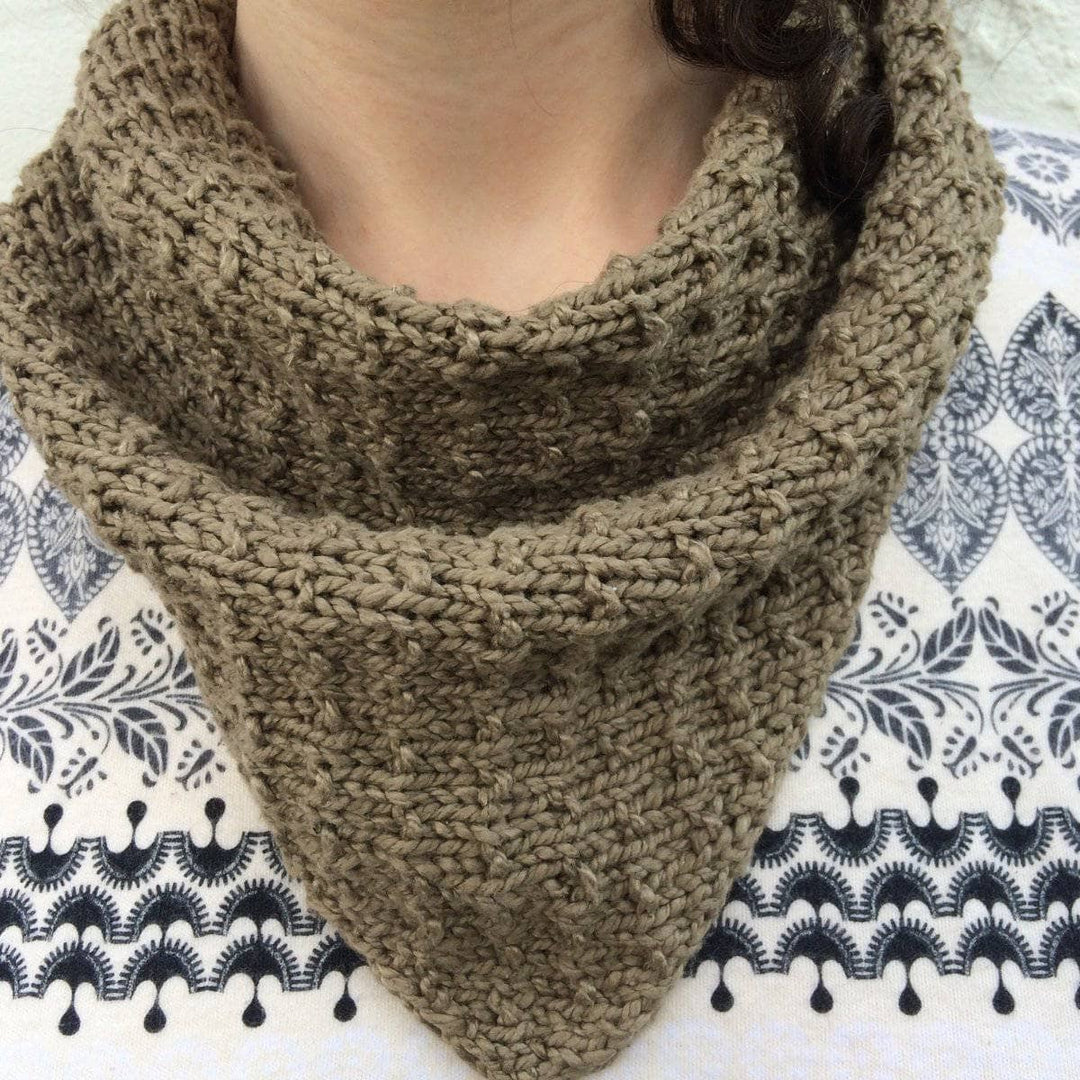 Closeup of woman wearing The Poppyseed Scarf in Stormy Night (brown)