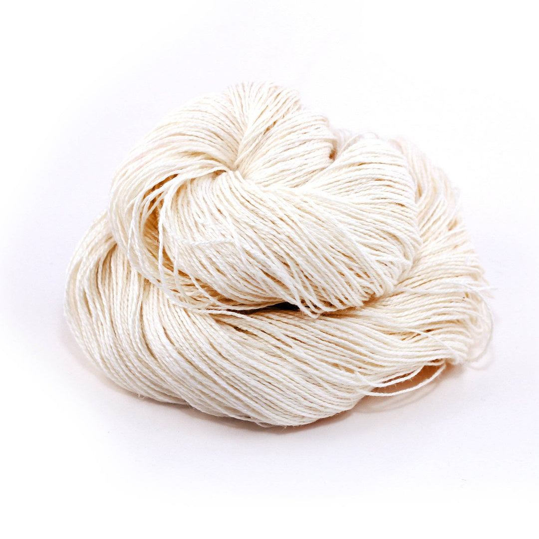 Sport weight linen 2-ply yarn ball in Polar Bear White on a white background
