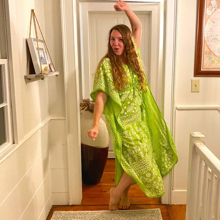 Nicole wearing a green and white nightgown