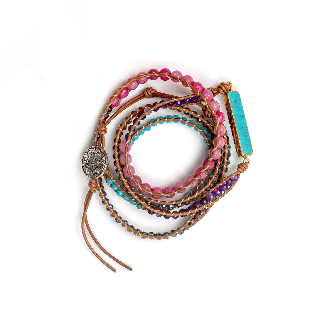 Turquoise and Pink Beaded Wrap Bracelet on a white backdrop. 